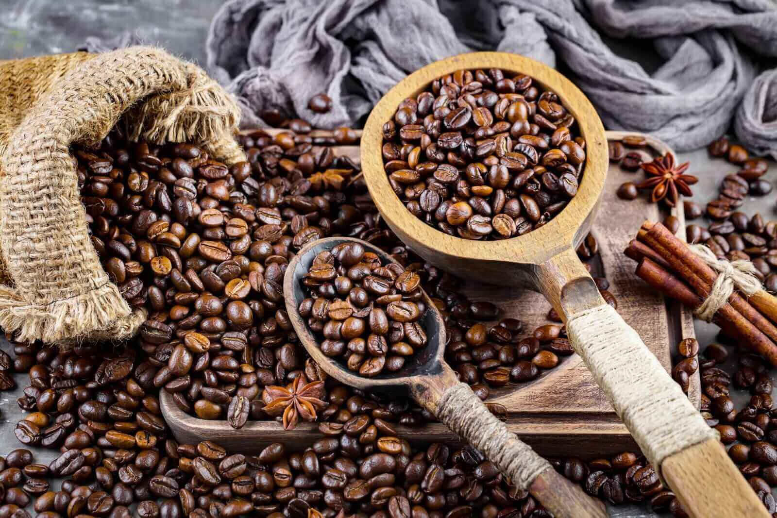 Coffee in a cup on a background of coffee beans by Zadorozhnyi Viktor via Shutterstock